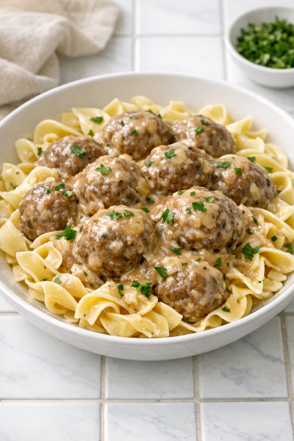 Finished slow cooker onion beef meatballs in creamy gravy