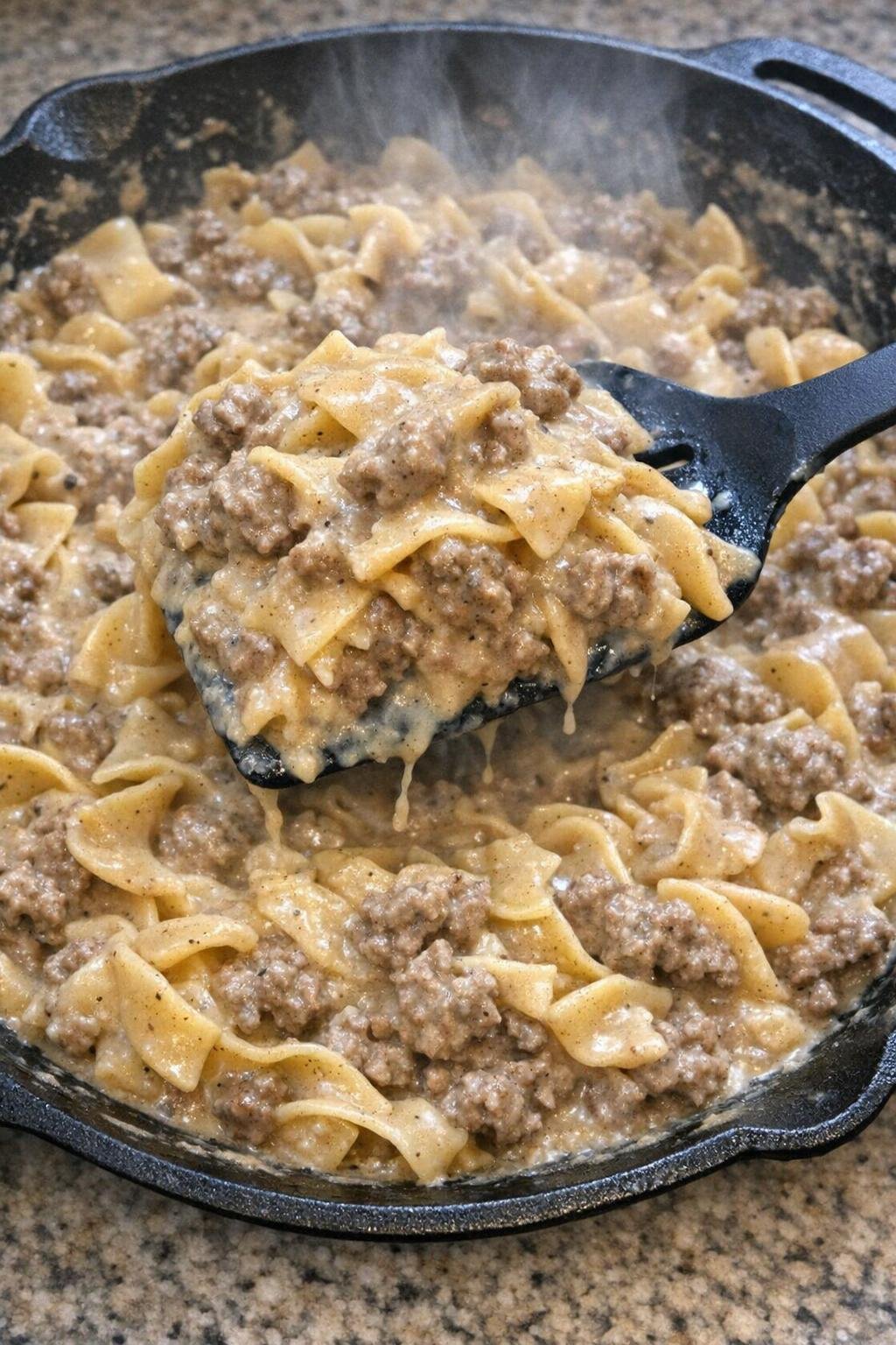 Finished hamburger stroganoff in a cast iron skillet