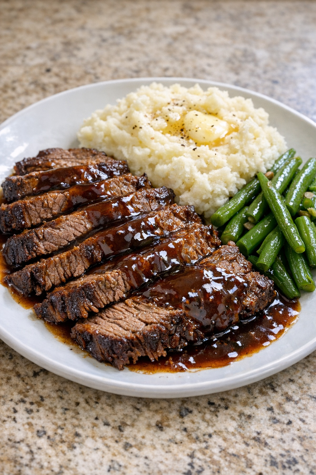 Finished Amish molasses brisket plated with gravy