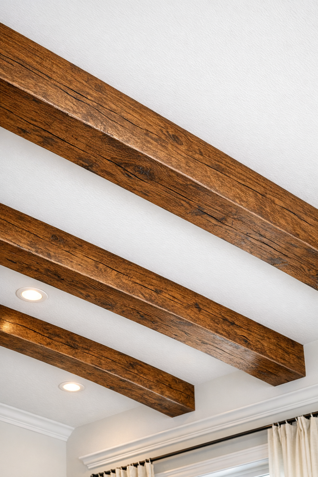 Finished faux wood ceiling beams installed on a ceiling