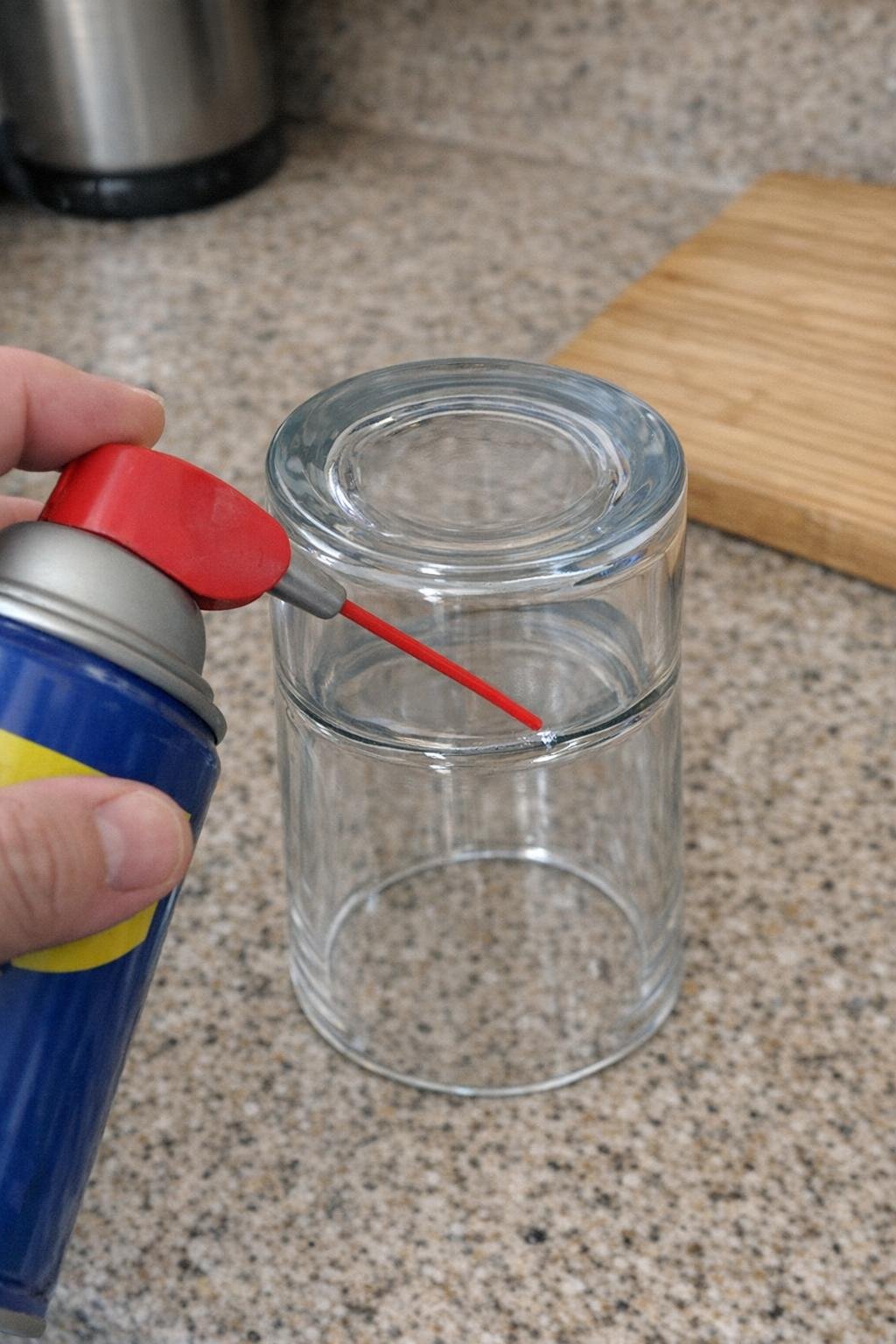 WD-40 applied around the seam of two stuck drinking glasses