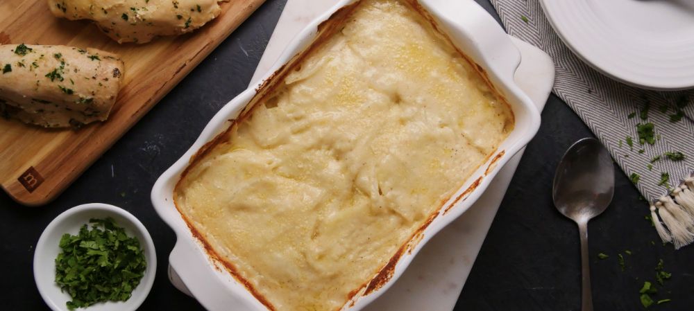 Layer Sliced Potatoes In Casserole Dish. In No Time, Get The Most Decadent Meal Yet Recipe and Video
