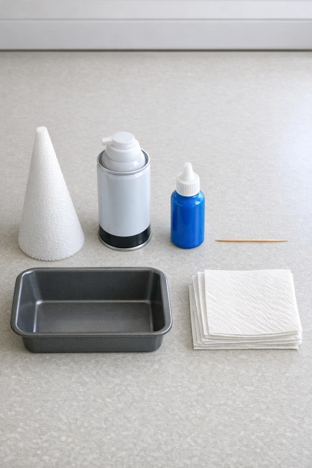 Materials laid out for the marbled foam cone project