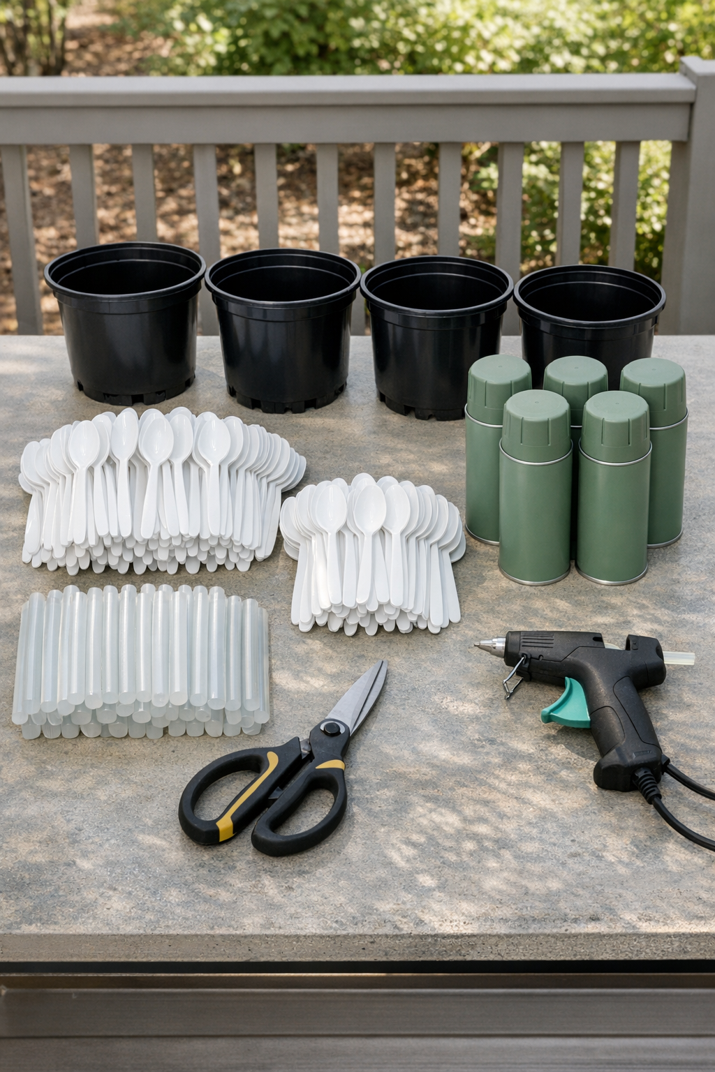 Materials for faux succulent porch planters laid out together