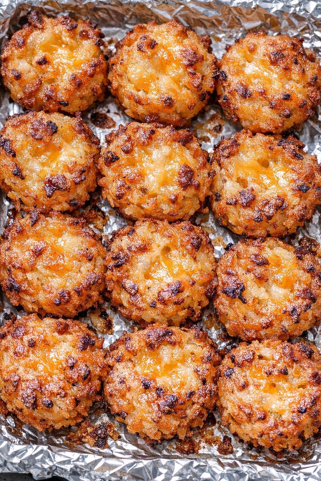 Southern 3-ingredient baked hashbrown bites on a foil-lined baking tray