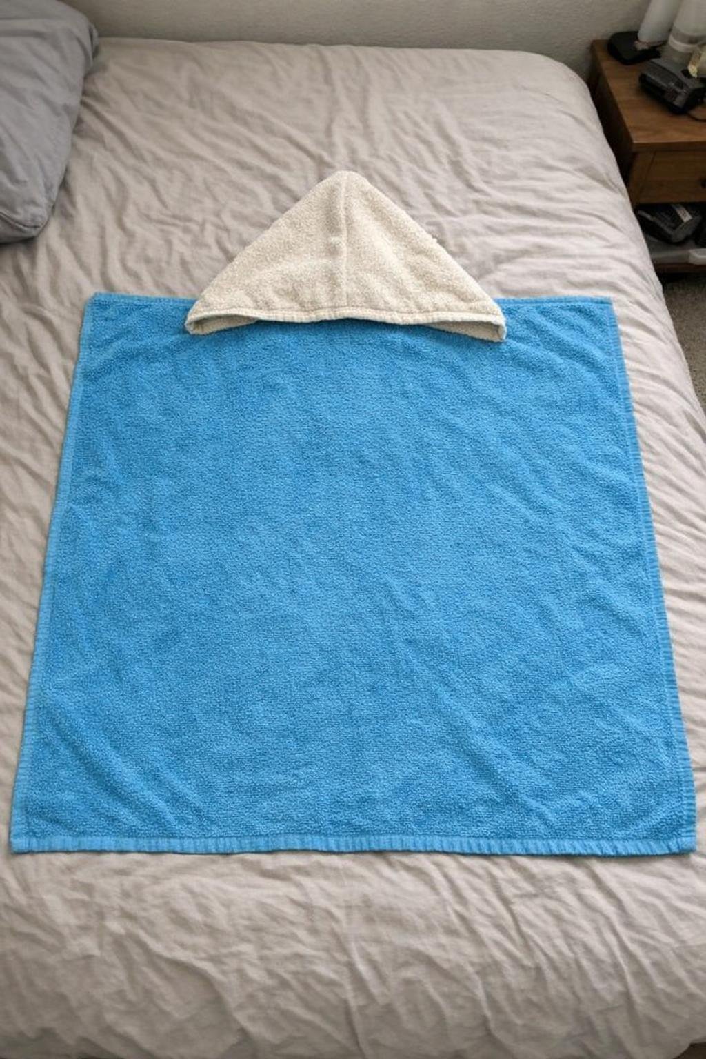 Child's hooded bath towel made from two towels