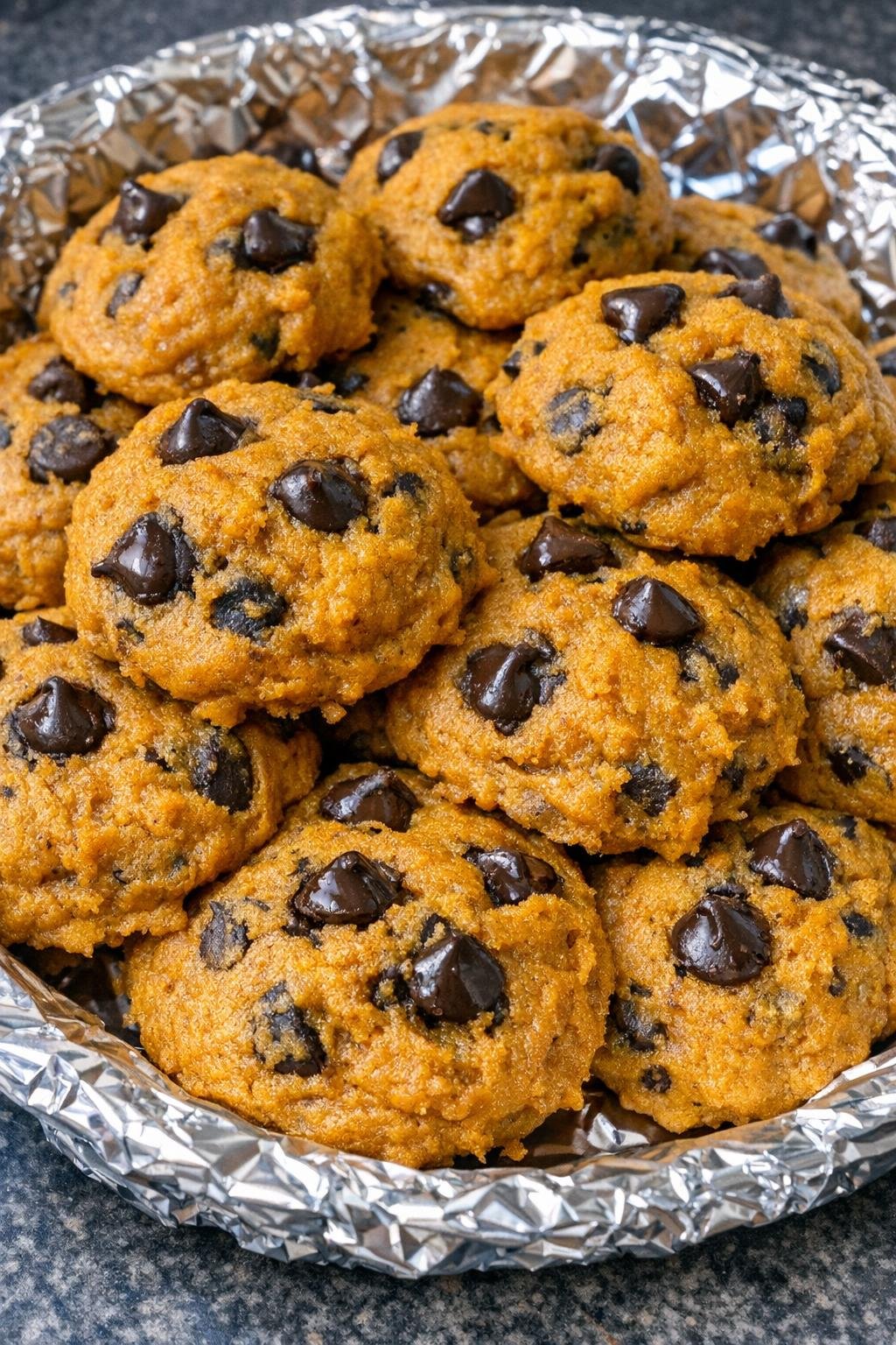 3-ingredient pumpkin chocolate chip cookies on a foil-lined platter