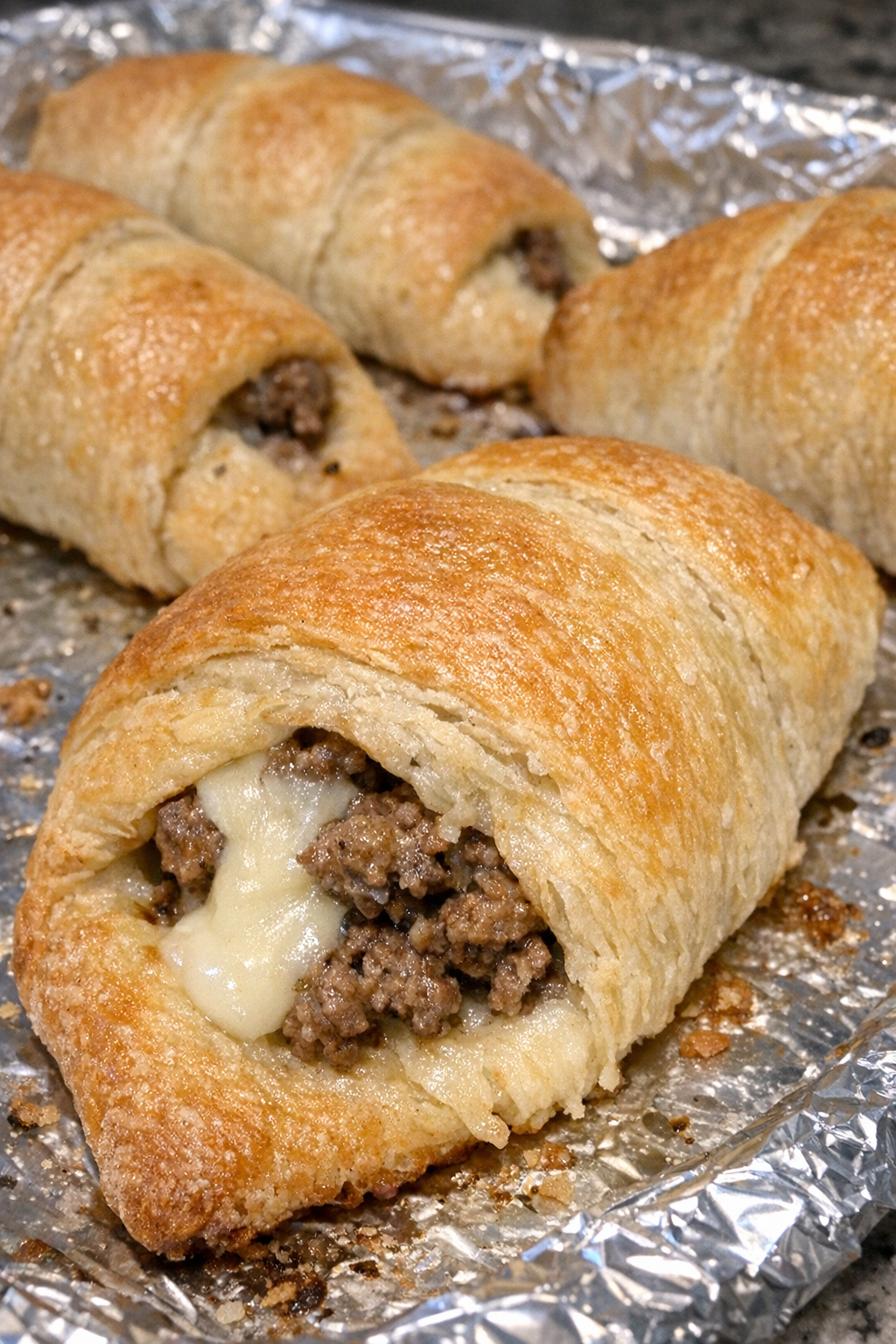 Golden brown beef crescent parcels fresh from the oven