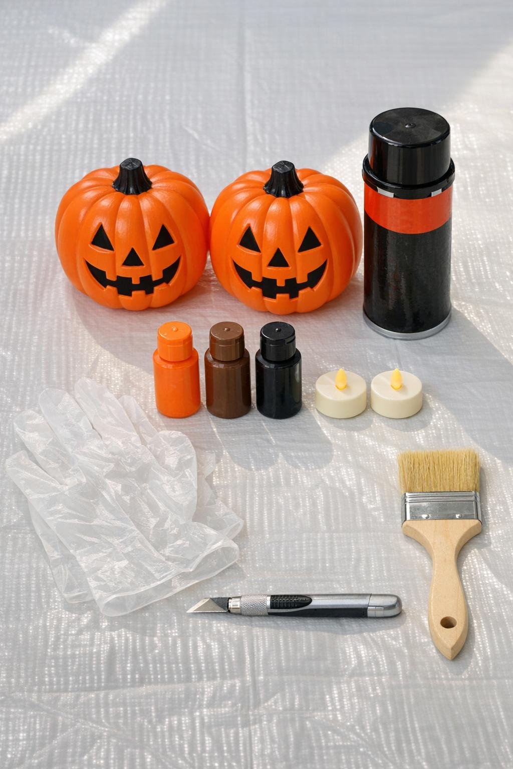 Materials for making aged foam-covered plastic pumpkins