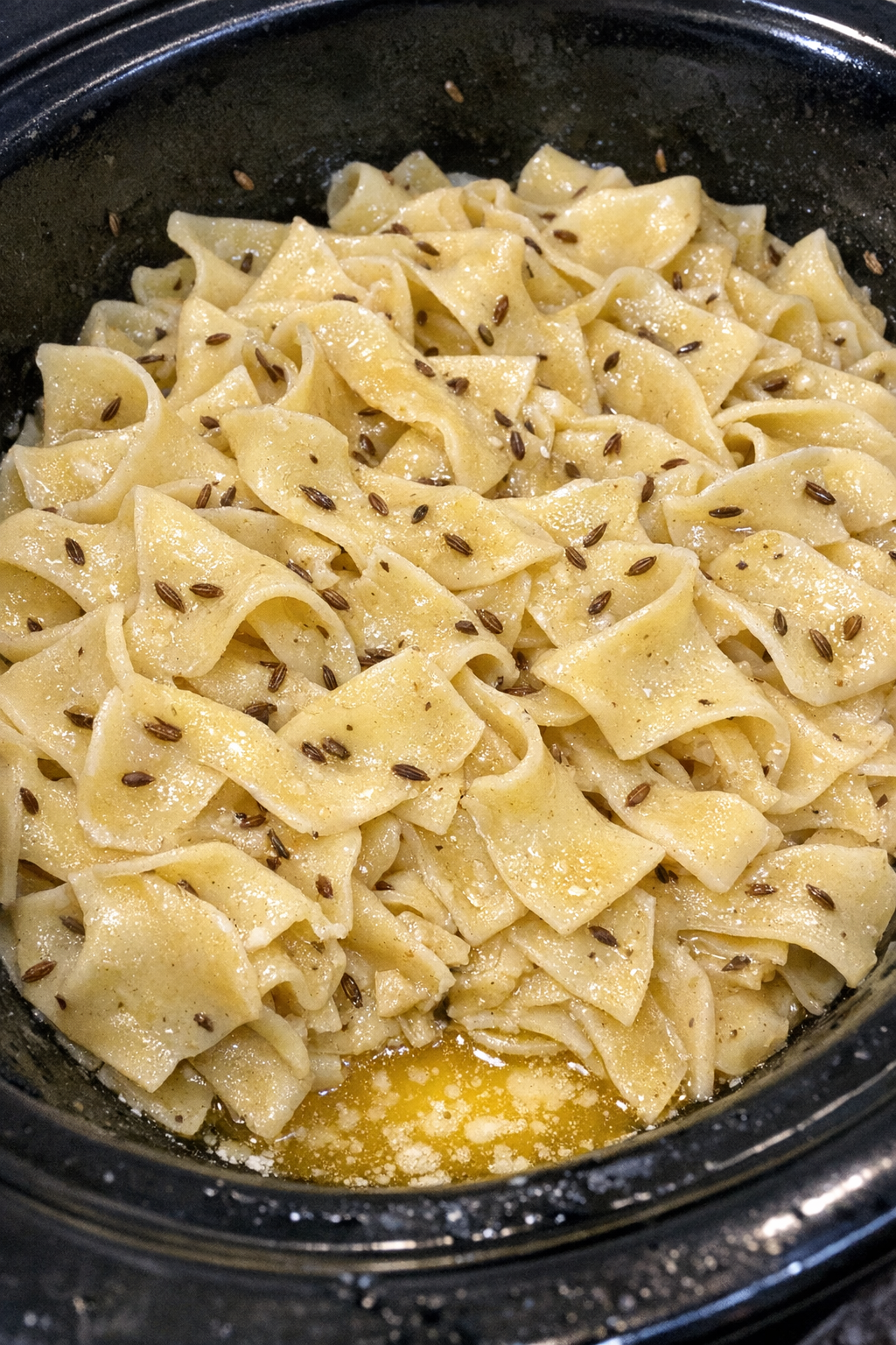 Slow cooker Amish caraway noodles ready to serve