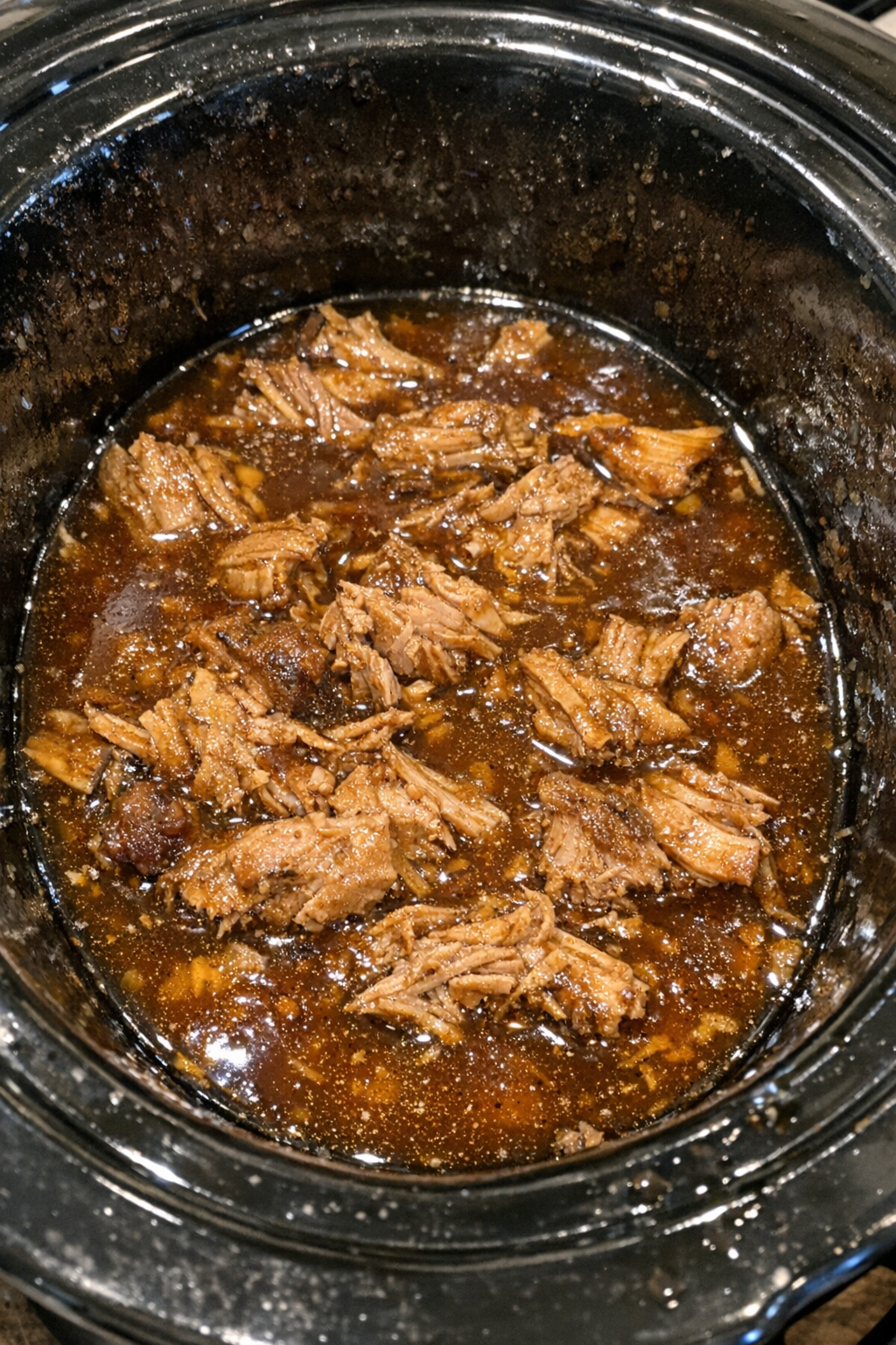 Slow cooker smoked pork chops in amber sauce