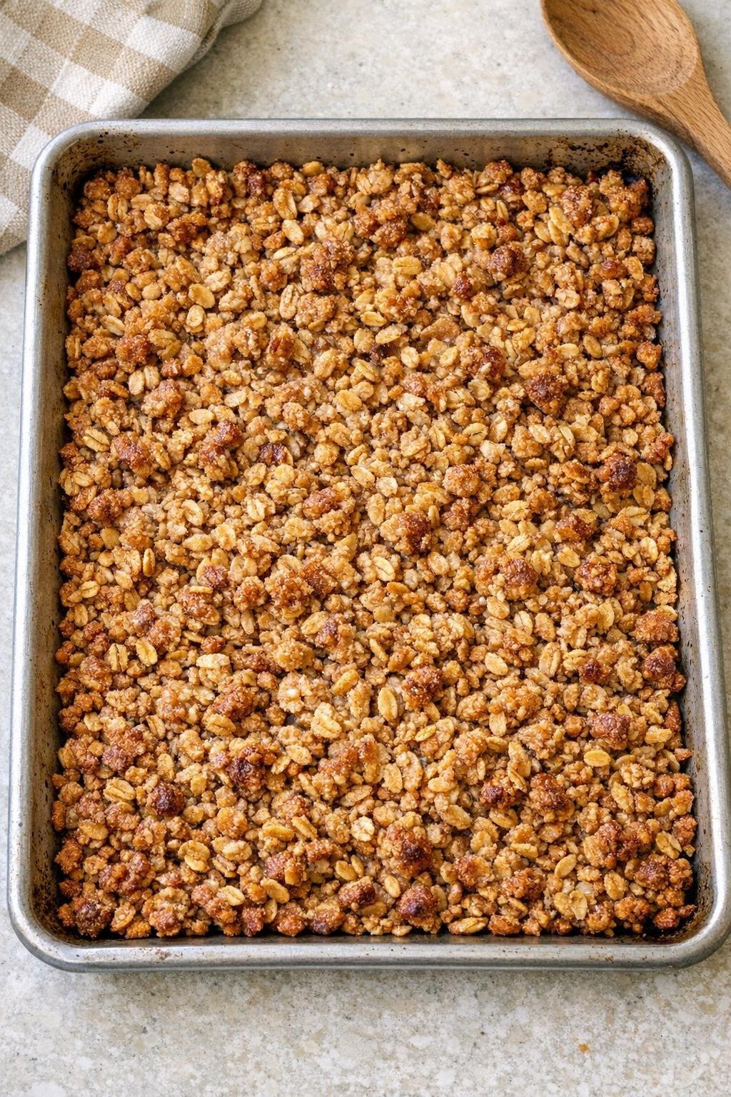 Finished baked oat crisp in a sheet pan