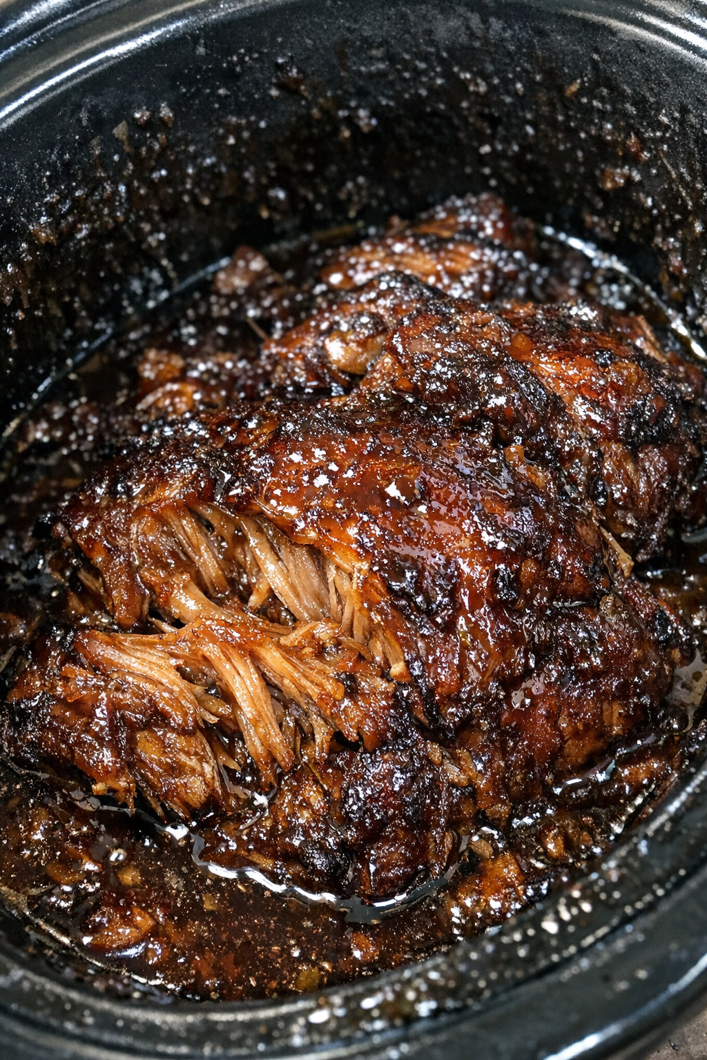 Slow cooker glazed roasted protein in dark amber sauce