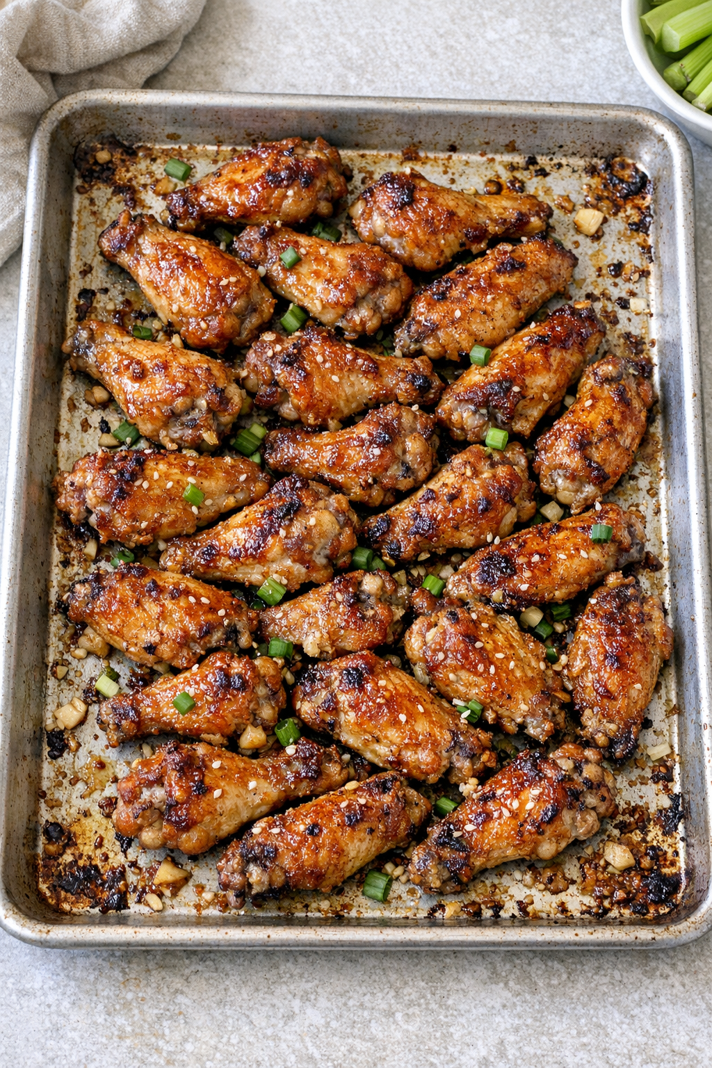Finished baked chicken wings on a sheet pan