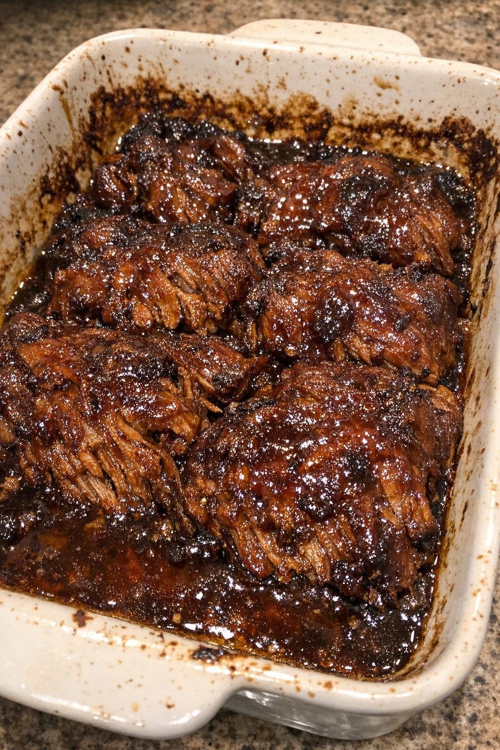 Roasted glazed casserole in a ceramic baking dish