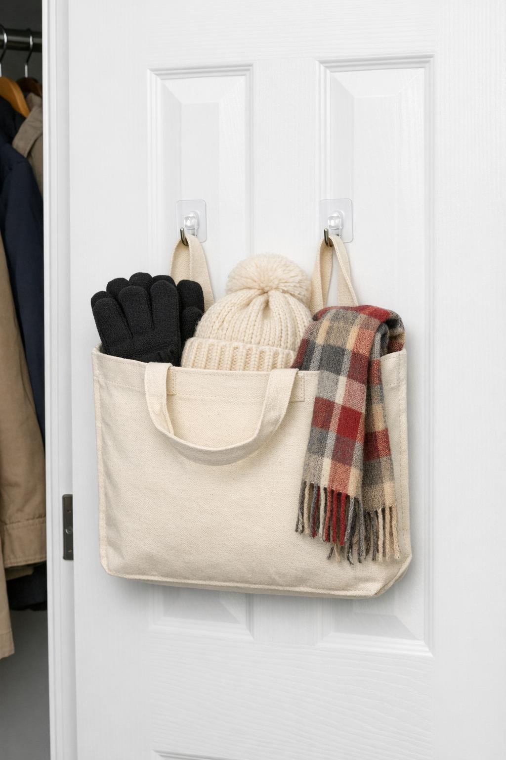 Finished canvas tote glove bin hanging inside a coat closet door
