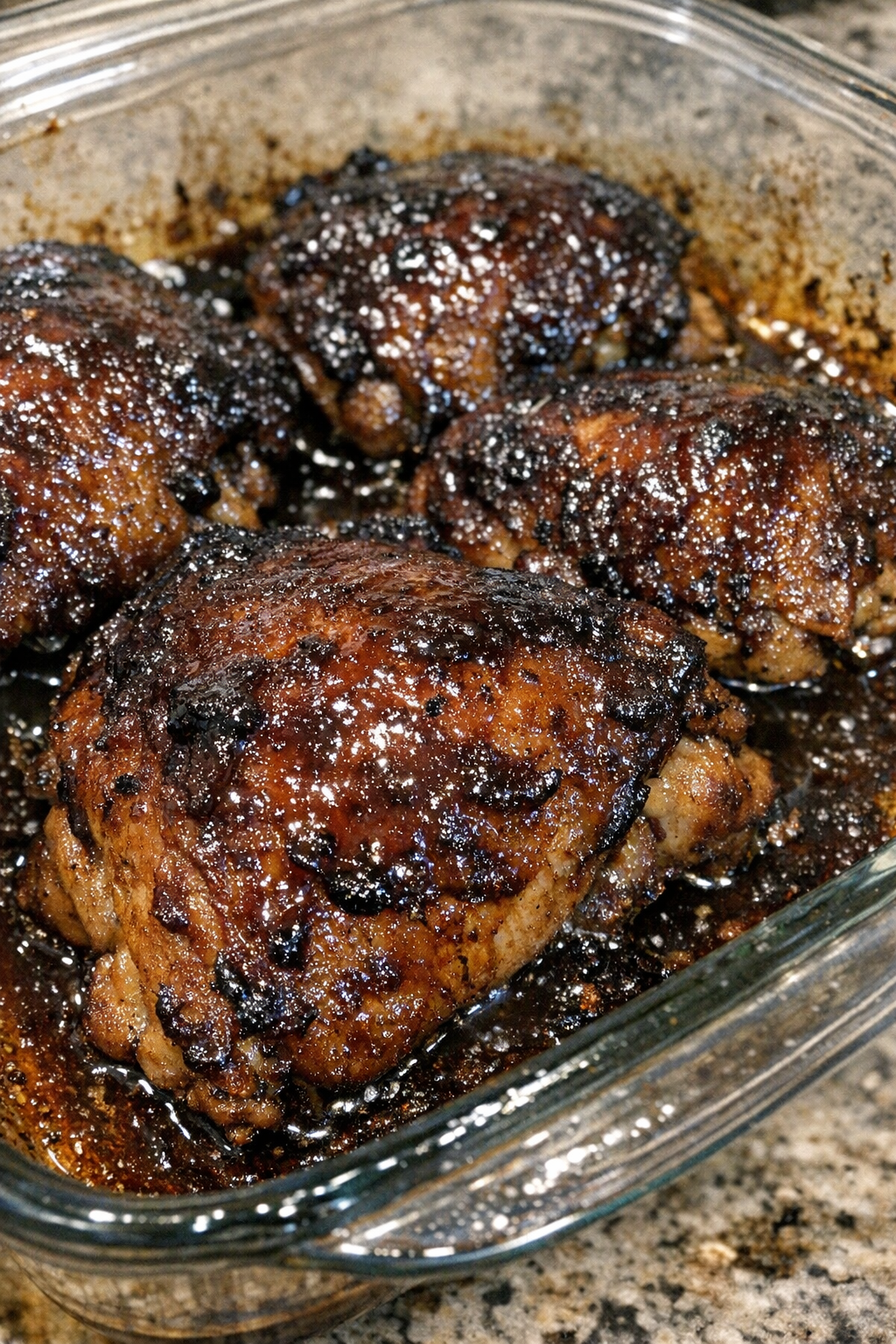 Glazed roasted protein in a glass baking dish