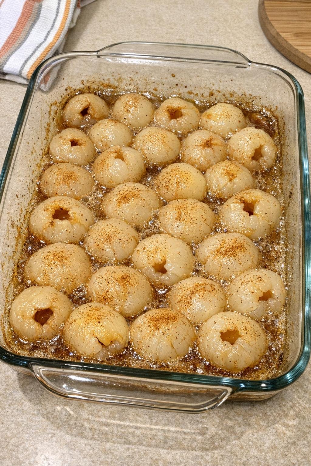 Finished baked lychee dessert in a glass baking dish