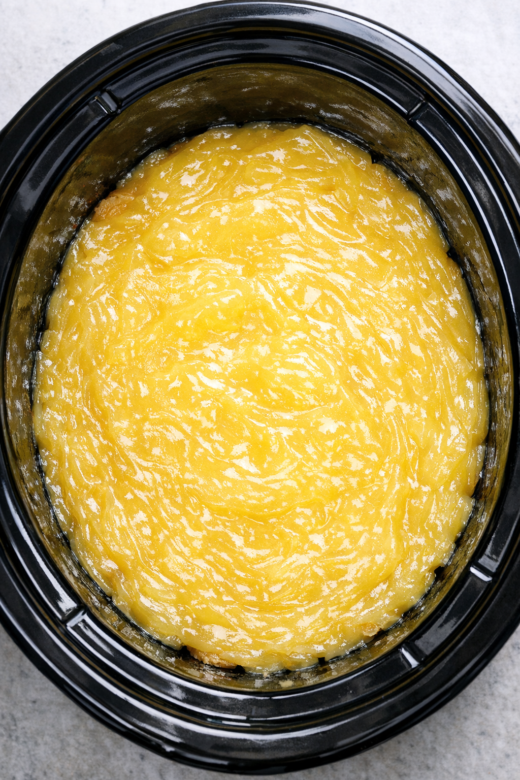 Lemon pie filling spread over cookies
