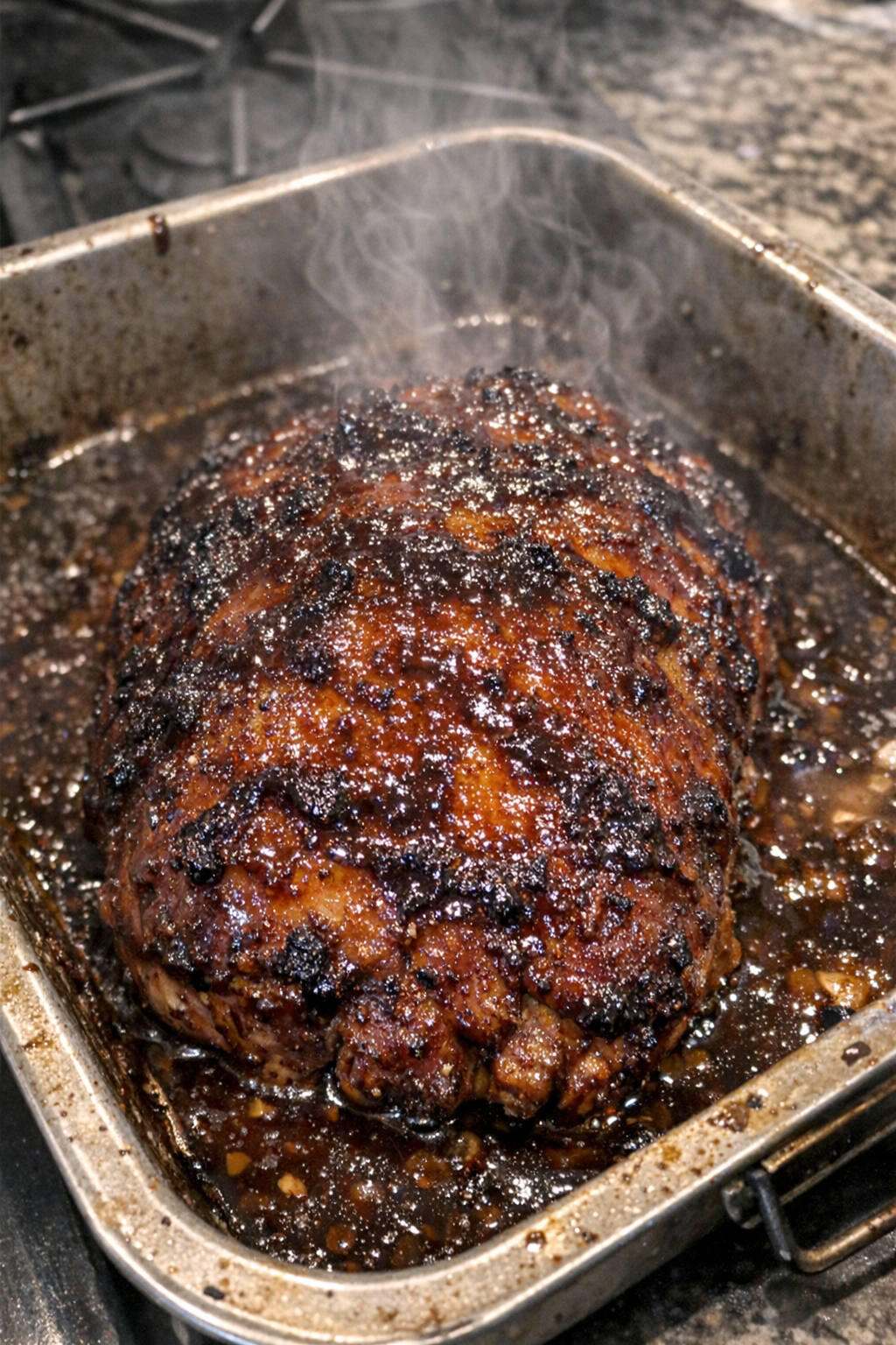 Roasted glazed protein in a roasting pan