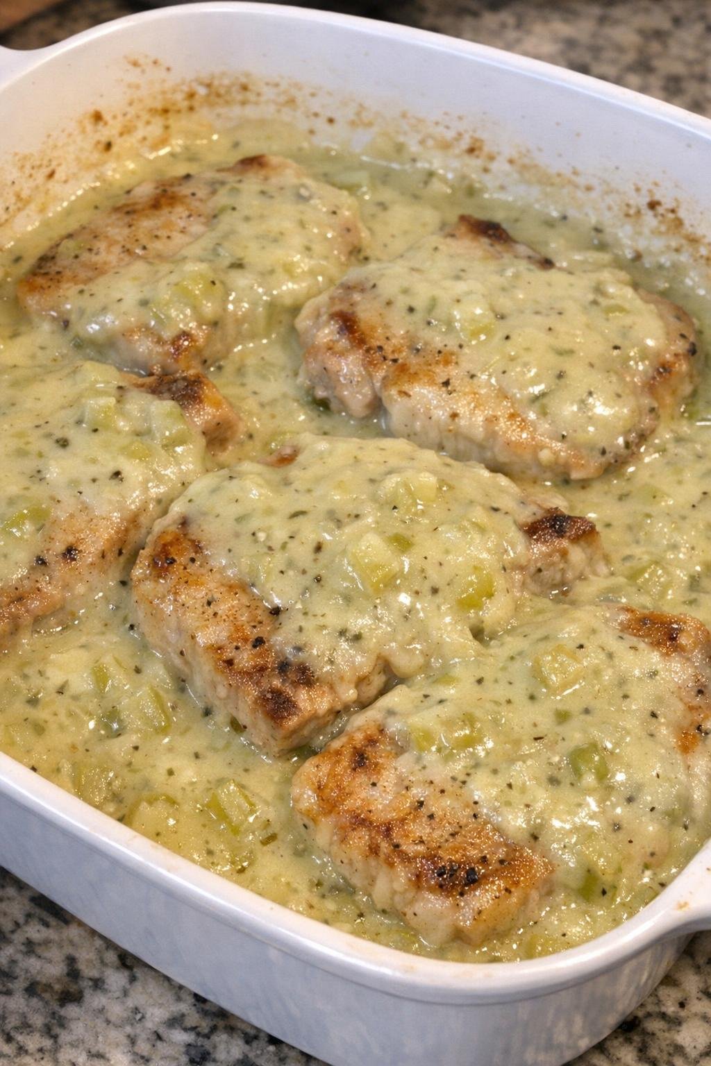 Finished pork chops in creamy celery sauce