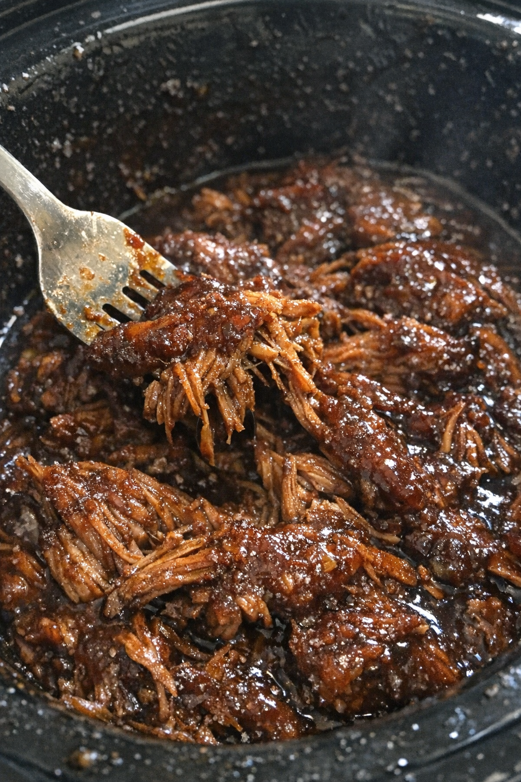 Slow cooker mahogany pulls in dark sauce