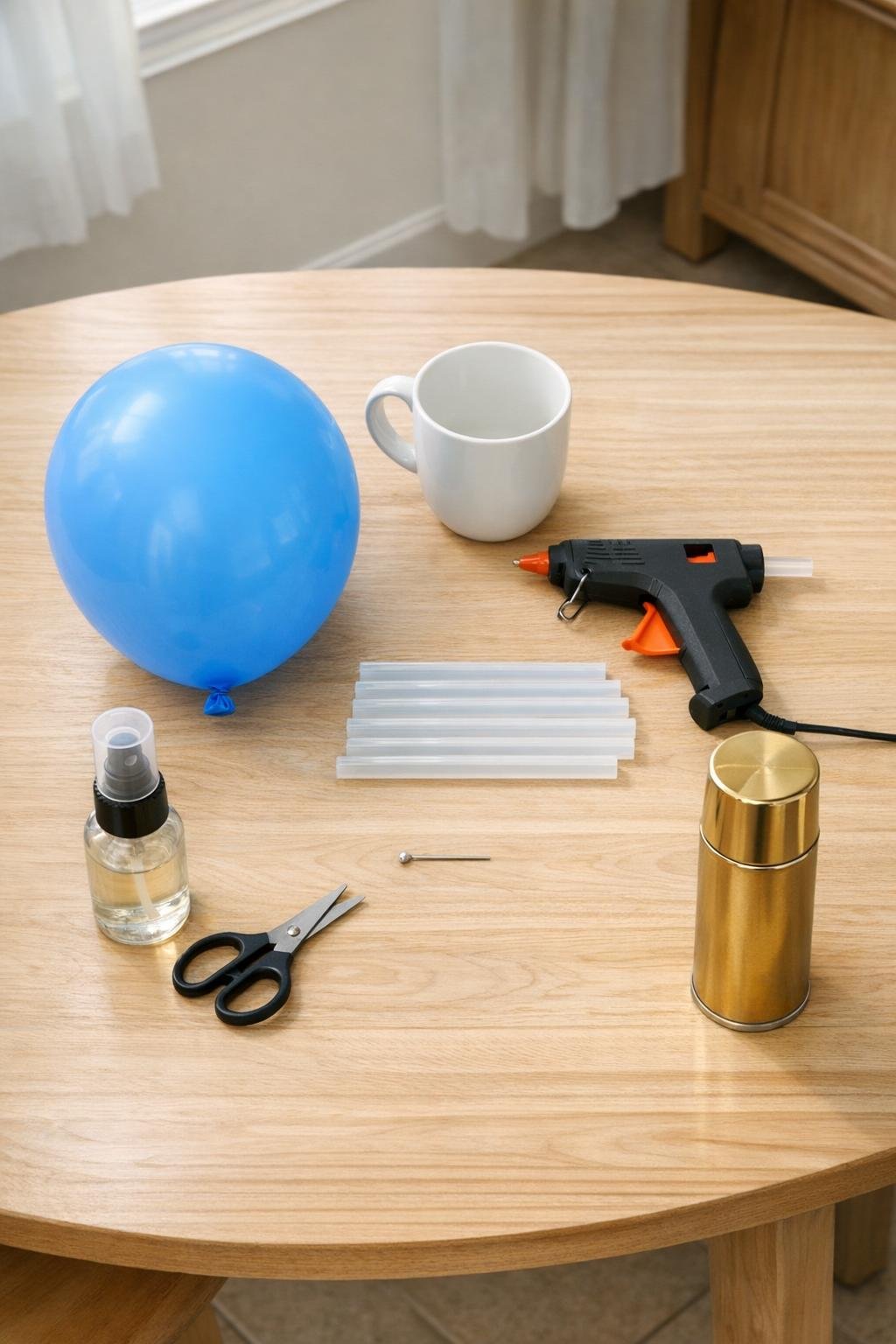 Materials for making a hot glue basket bowl laid out on a table