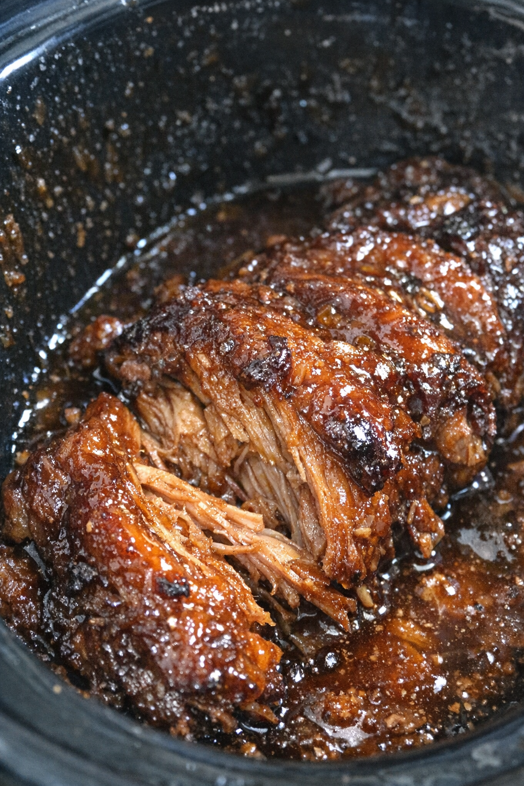 Slow-cooked glazed protein in a slow cooker