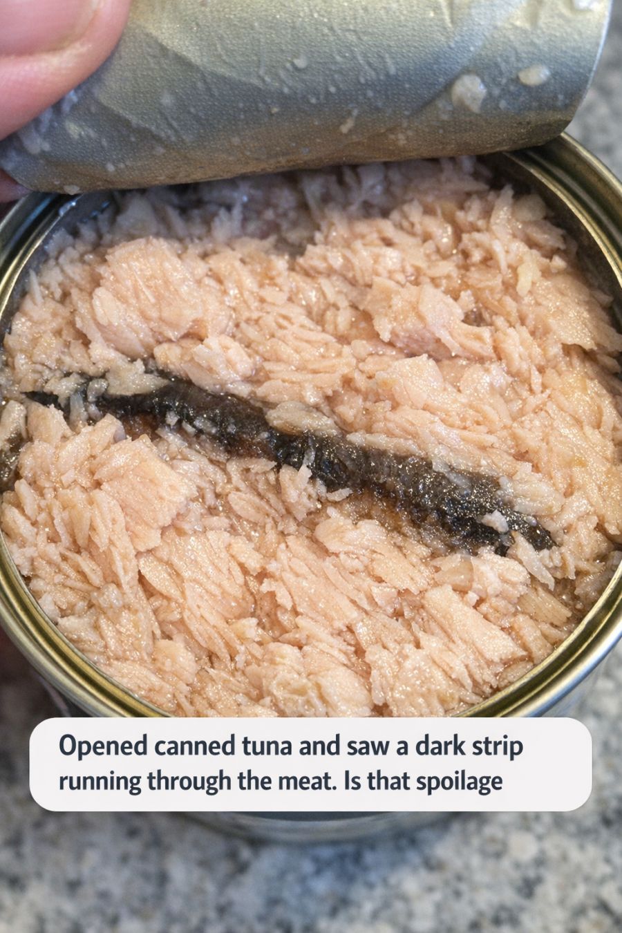 Opened canned tuna and saw a dark strip running through the meat. Is