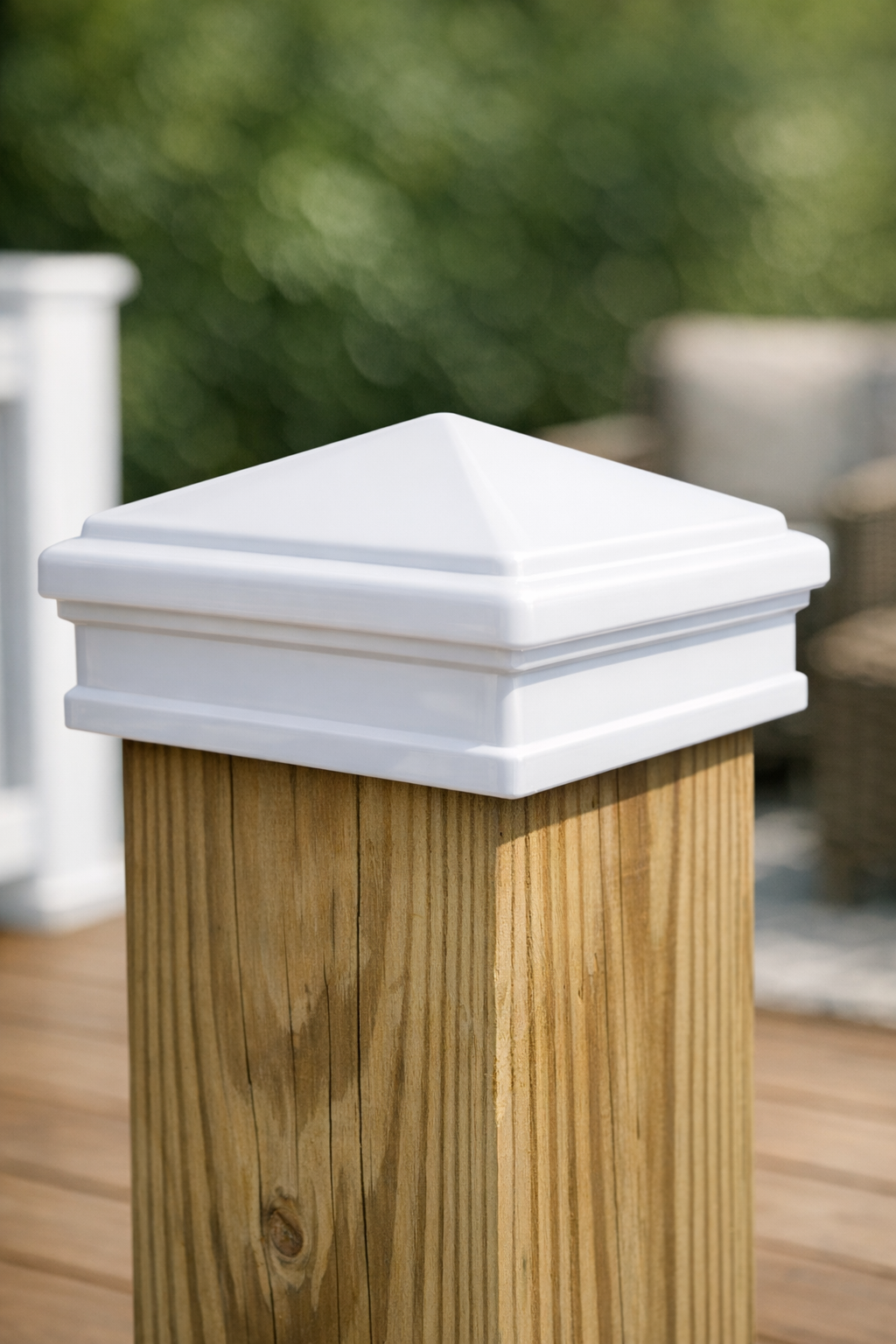 Finished heavy-duty plastic deck post cap fitted on a wooden post