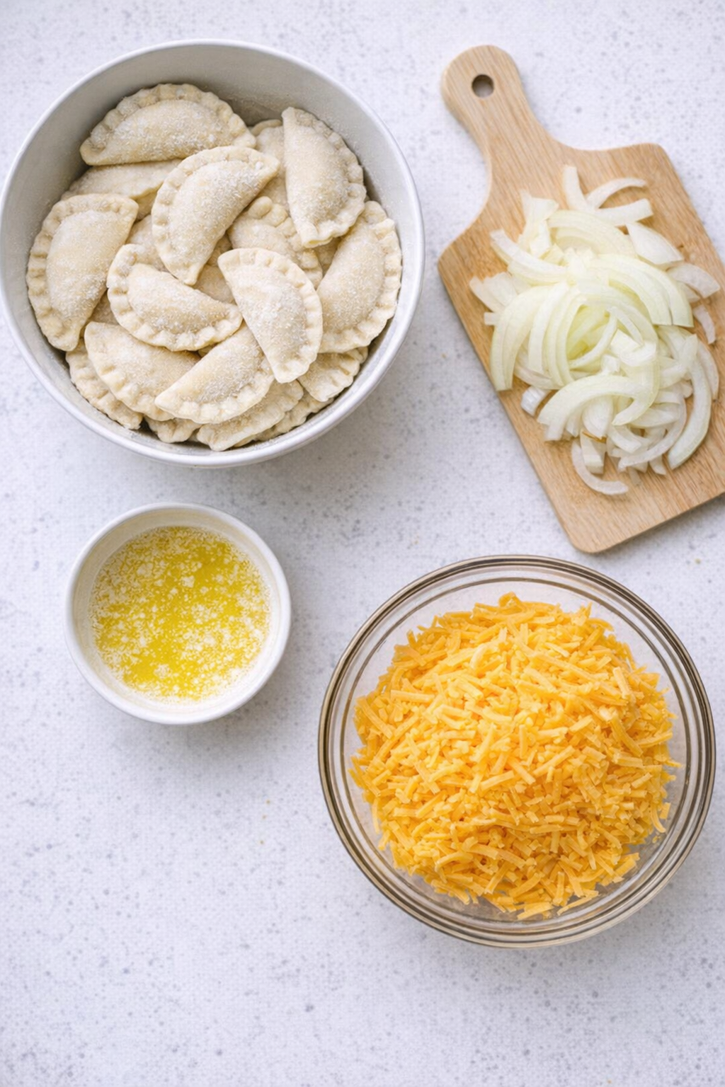 Simple pierogi ingredients laid out on a kitchen counter