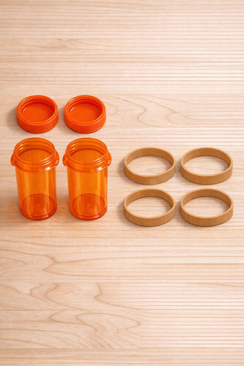 Materials for DIY cabinet latches laid out on a work surface