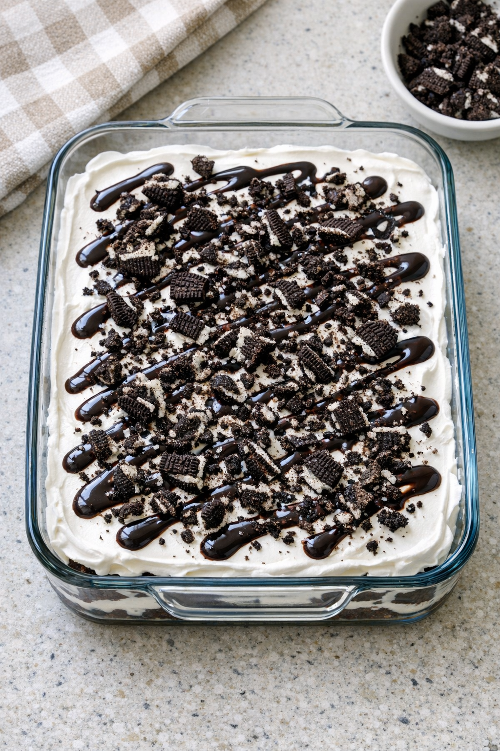 Finished ice cream sandwich dessert in glass baking dish