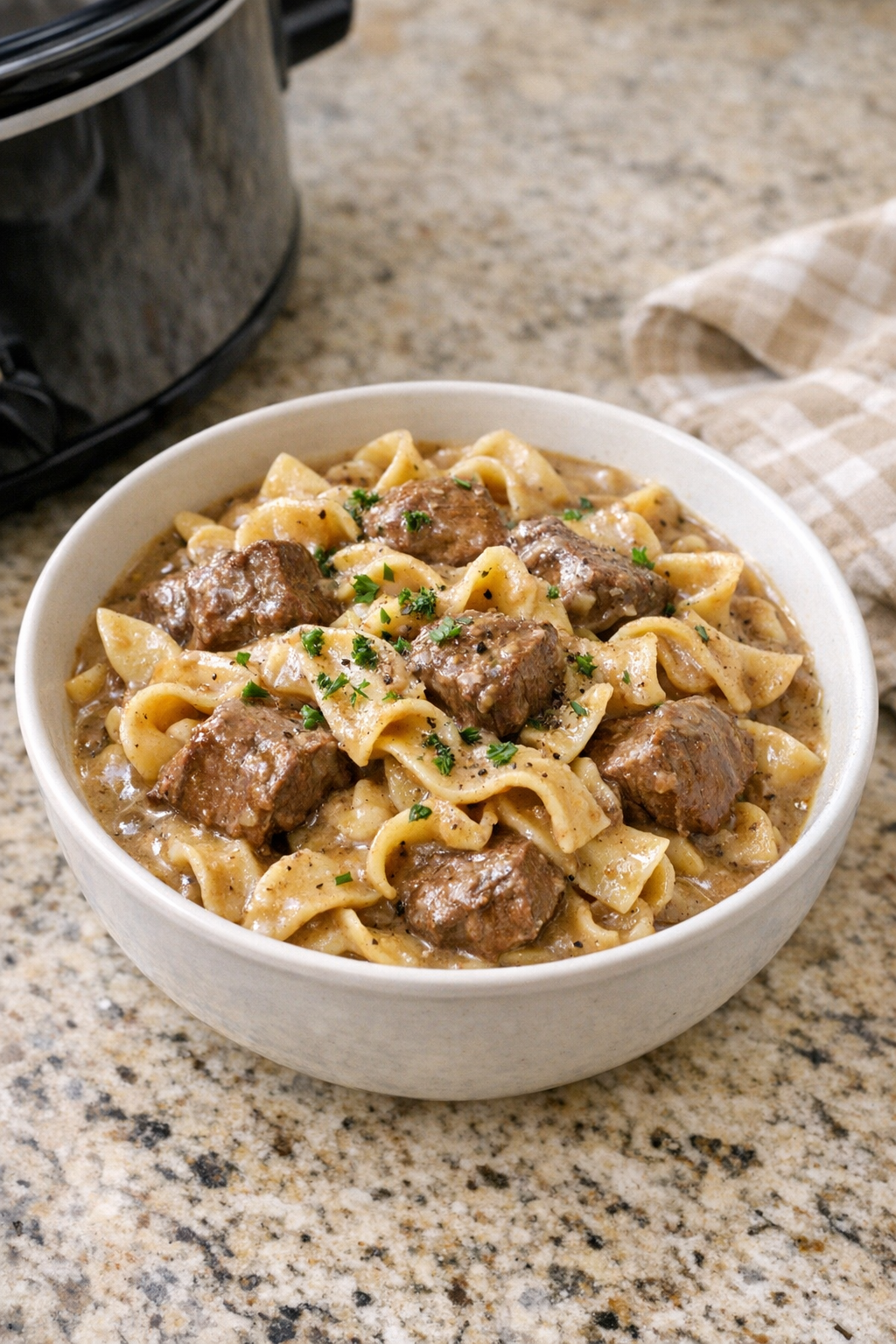 Finished Amish beef and noodles in a serving bowl