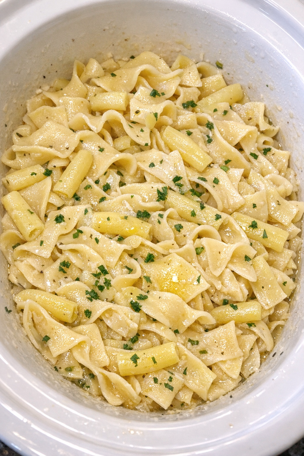 Slow cooker Amish wax bean noodles in a white slow cooker