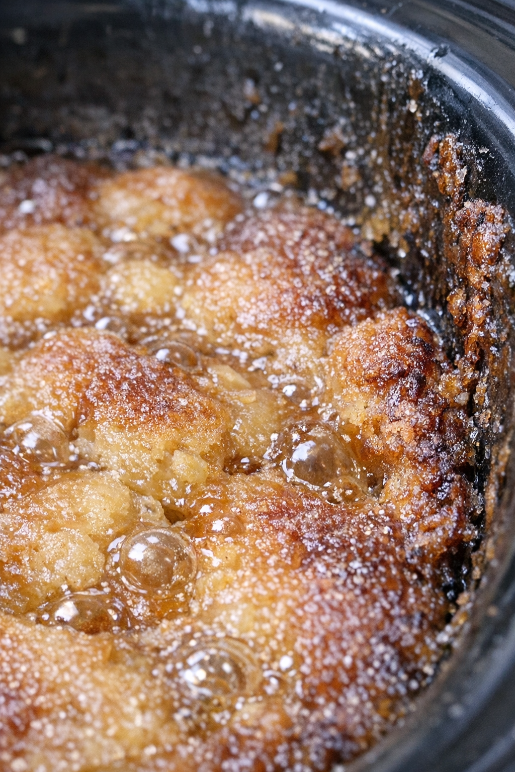 Bubbling golden-brown slow cooker dessert
