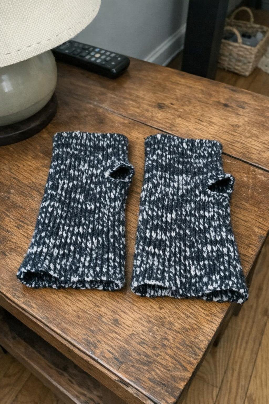 A pair of fingerless wrist warmers made from chunky knit socks