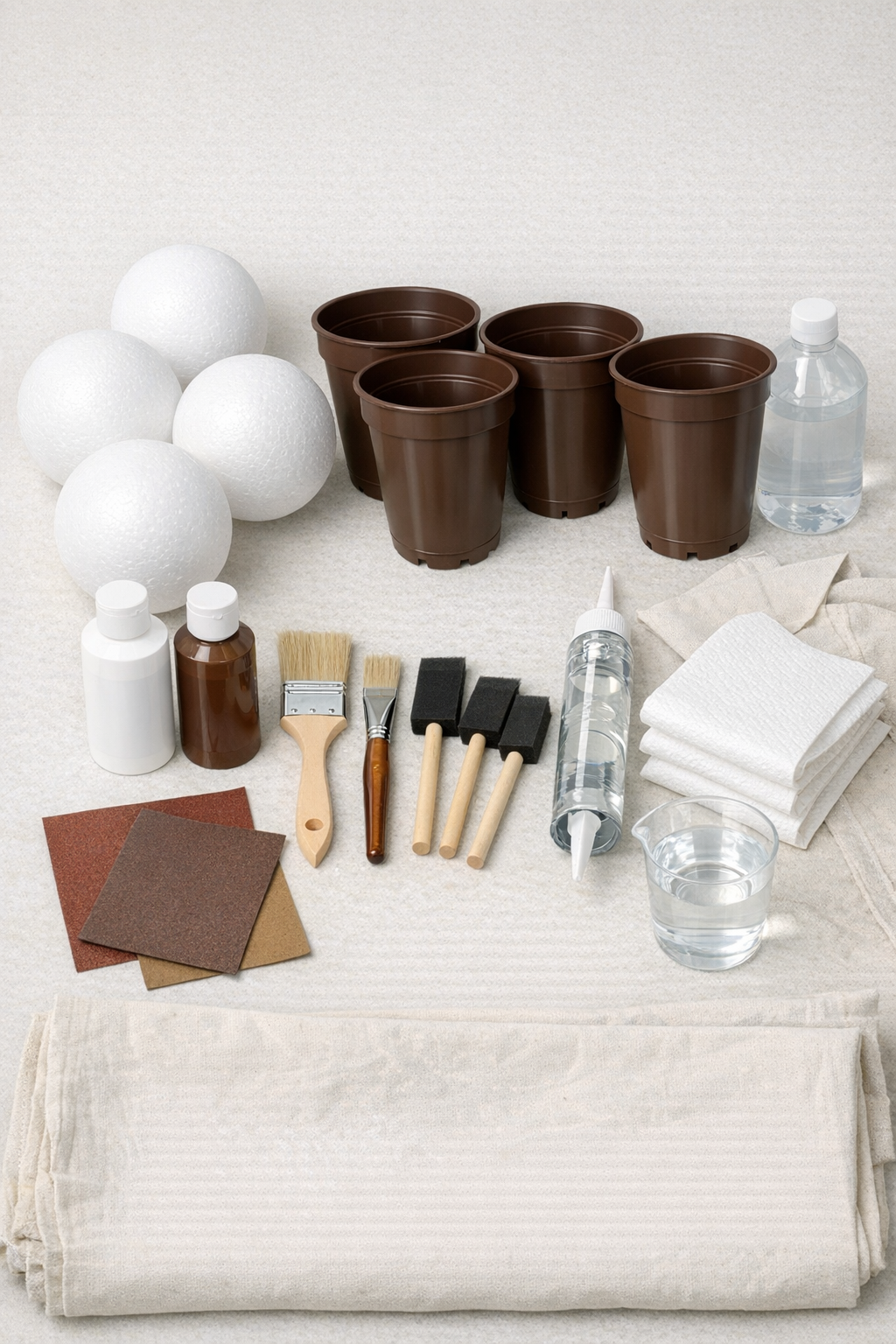 Materials for giant porch ice cream cone decorations laid out on a worktable