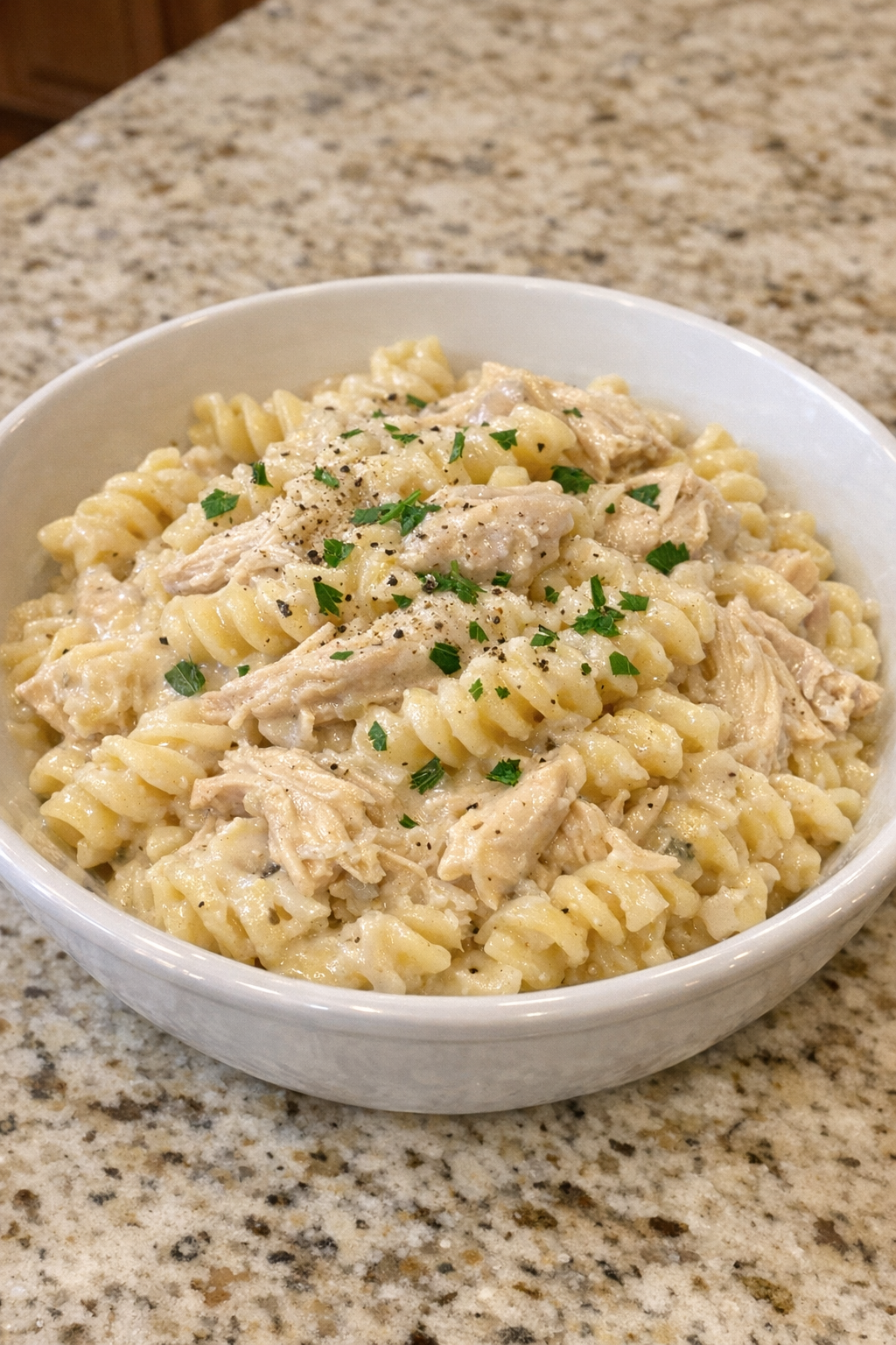 Creamy chicken pasta served in a bowl