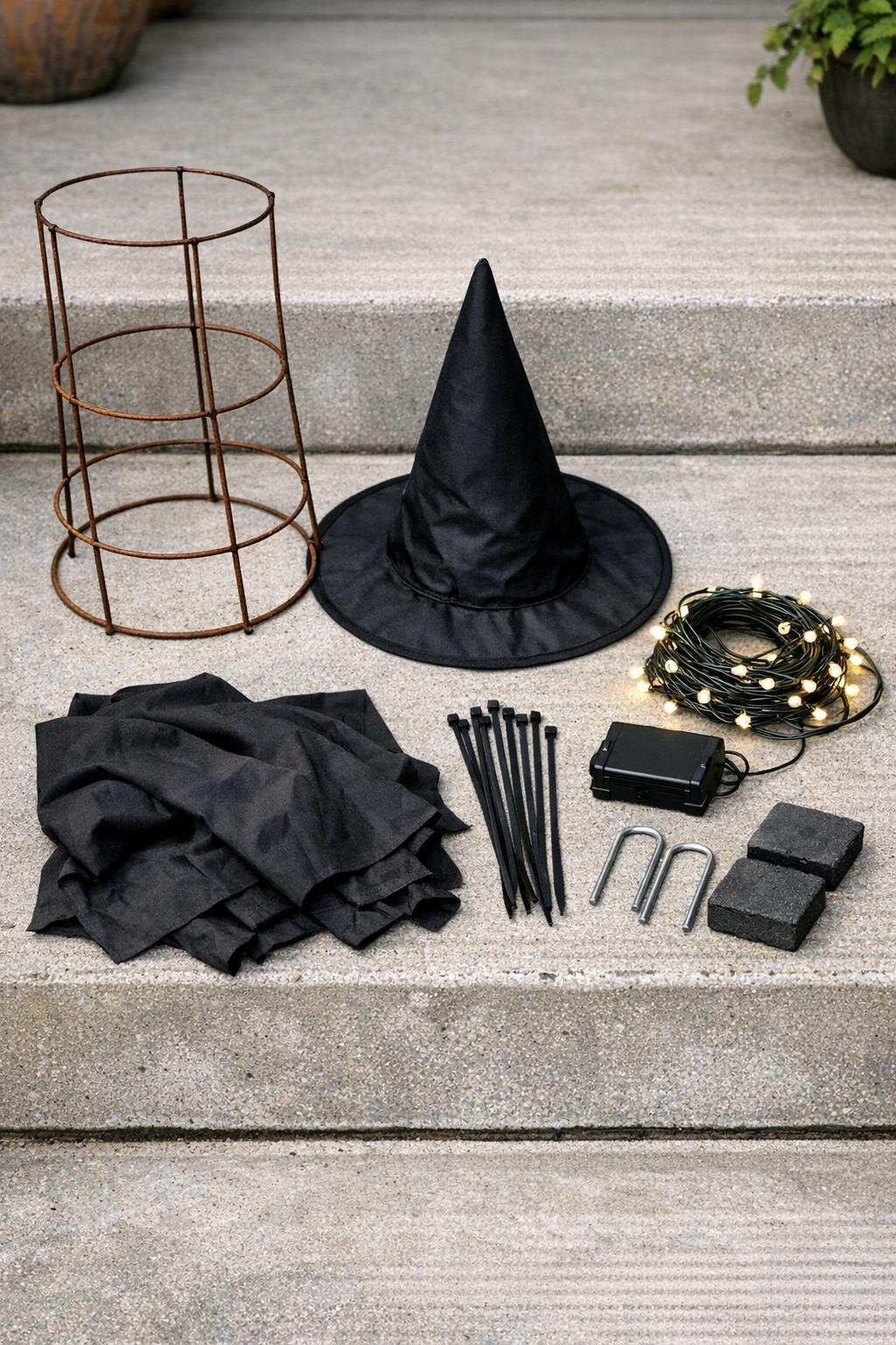 Materials for making a glowing porch witch laid out on a porch