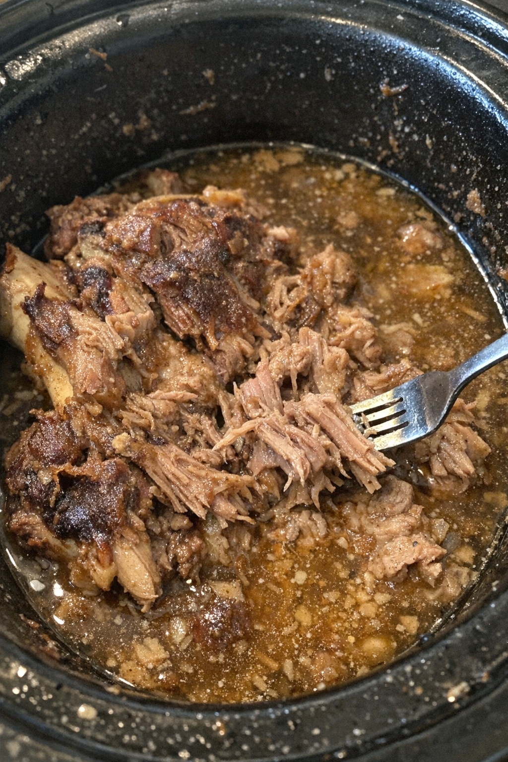 Slow cooker supper with tender meat in broth