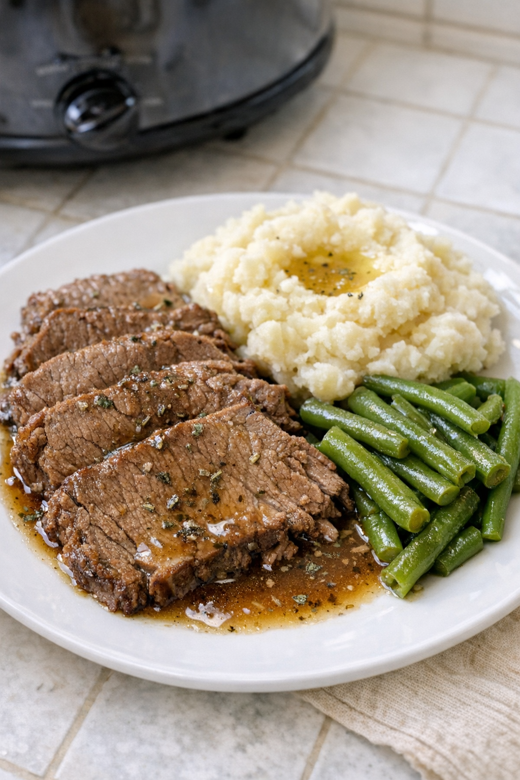 Finished Amish sage beef plated with rich juices