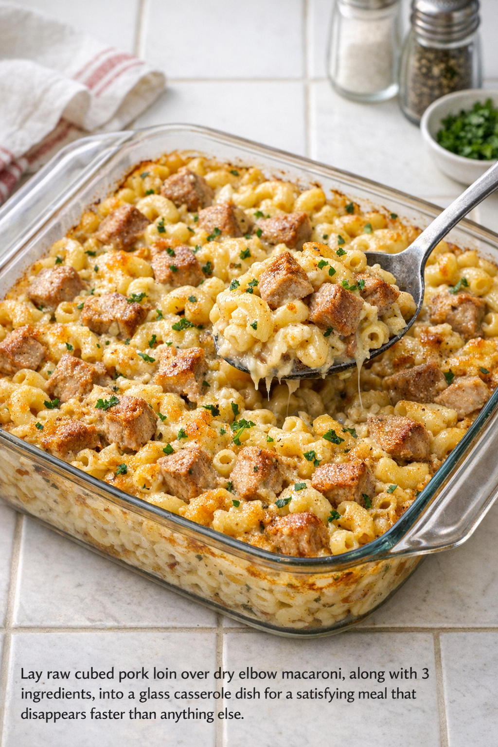 Finished baked pork loin macaroni casserole in a glass dish