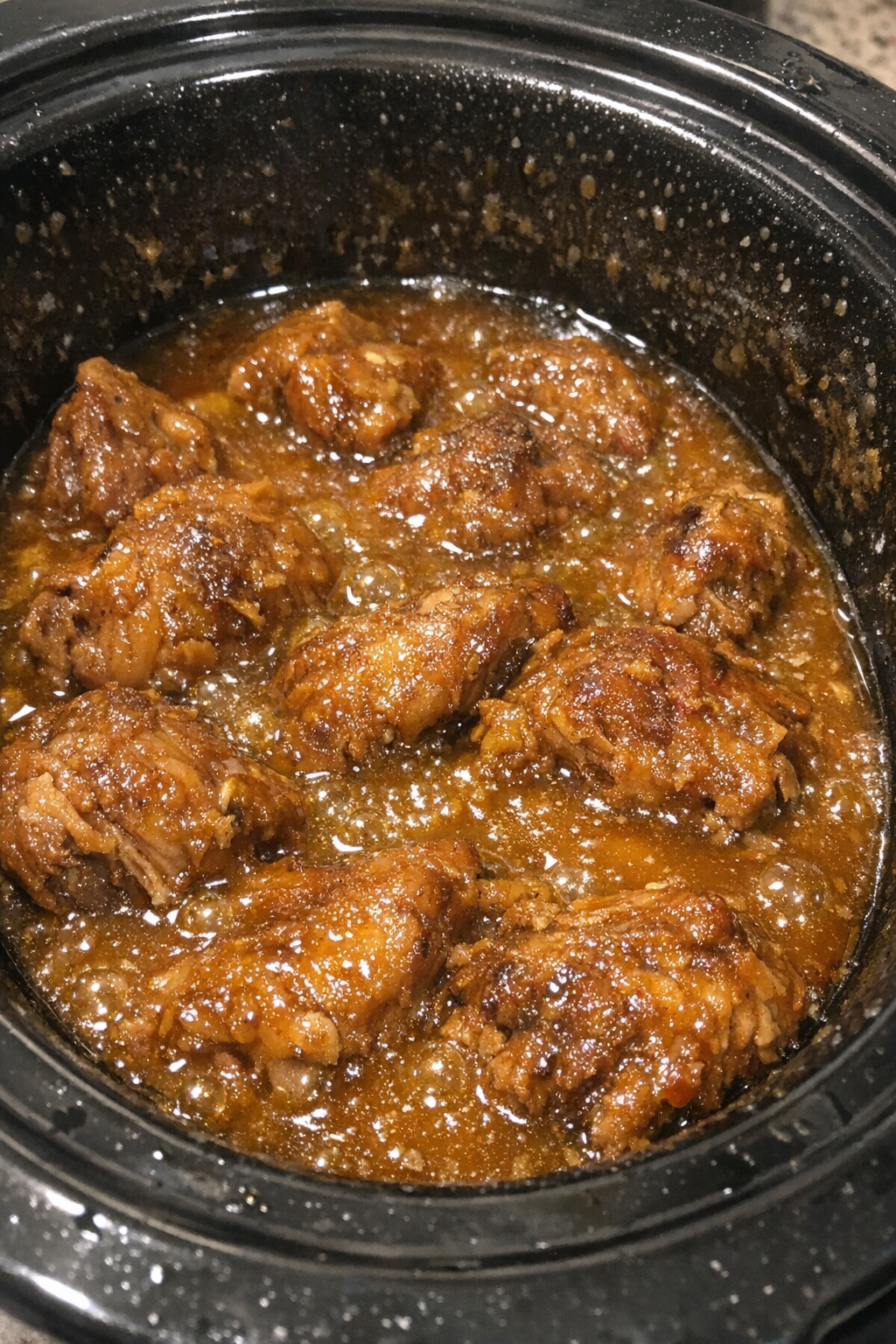 Slow cooker supper in glossy golden sauce