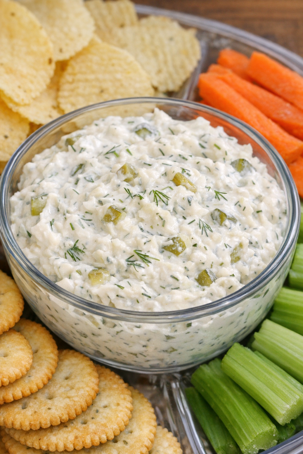 Southern 4-ingredient dill pickle dip in a glass bowl on a potluck tray