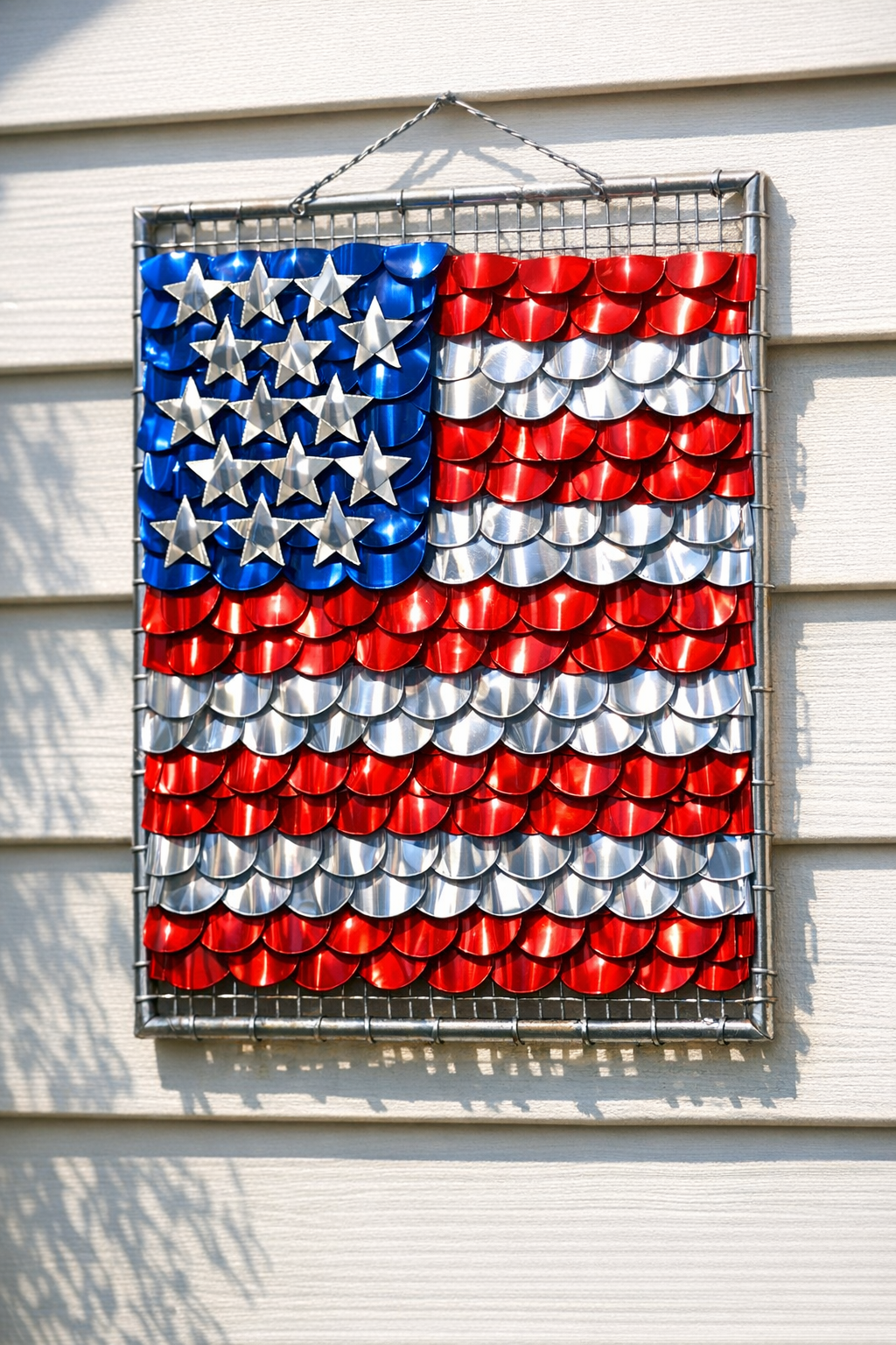 Finished patriotic outdoor siding decoration made from aluminum soda cans