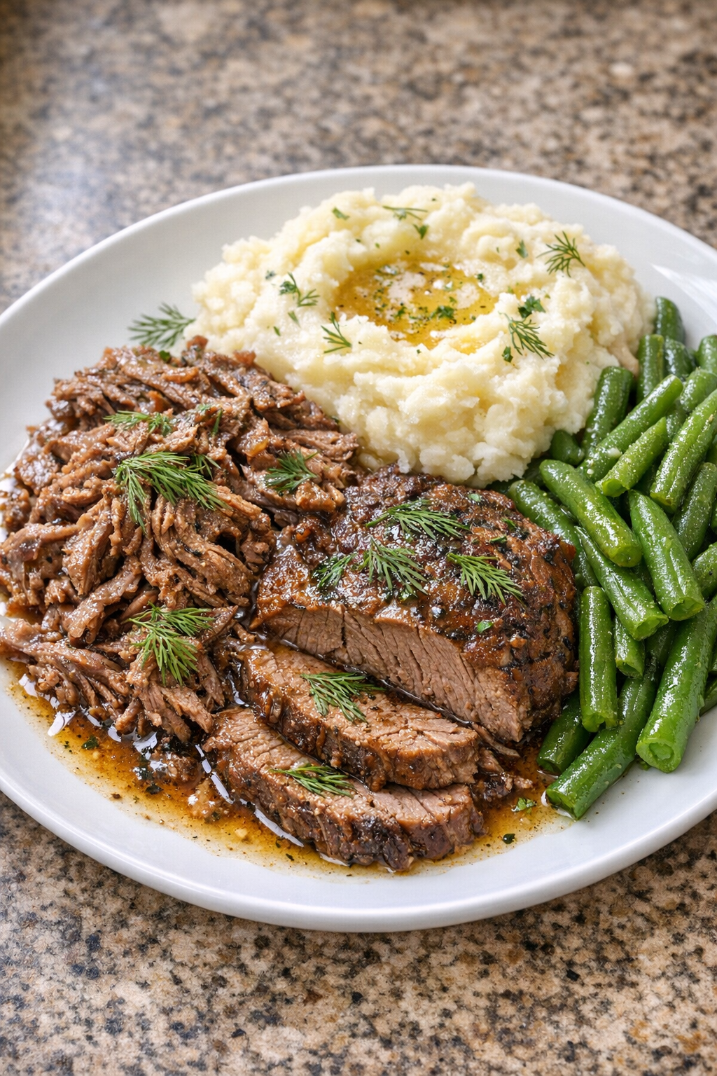 Finished Amish dill beef plated with potatoes
