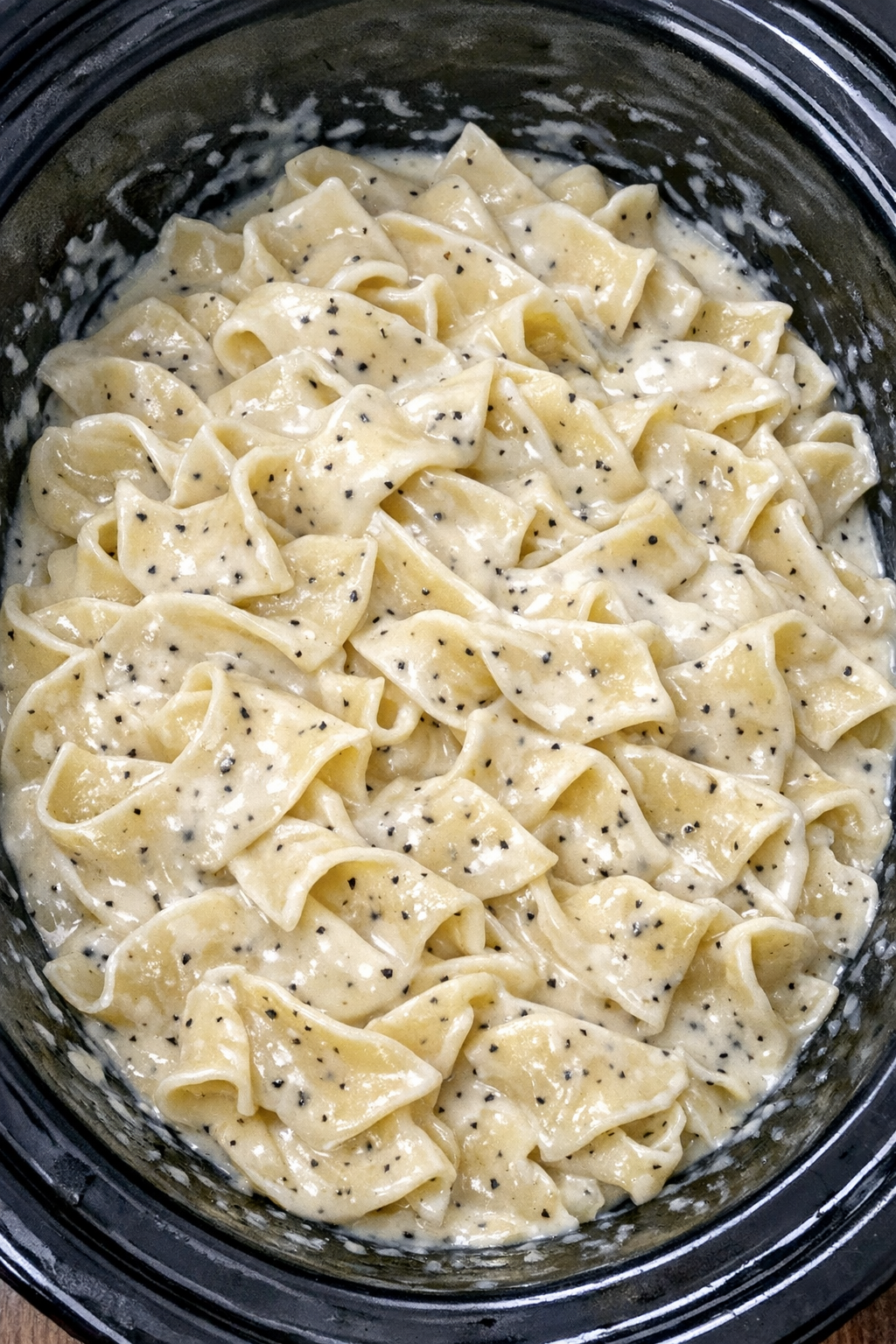 Close-up of Amish cream cheese noodles in a slow cooker