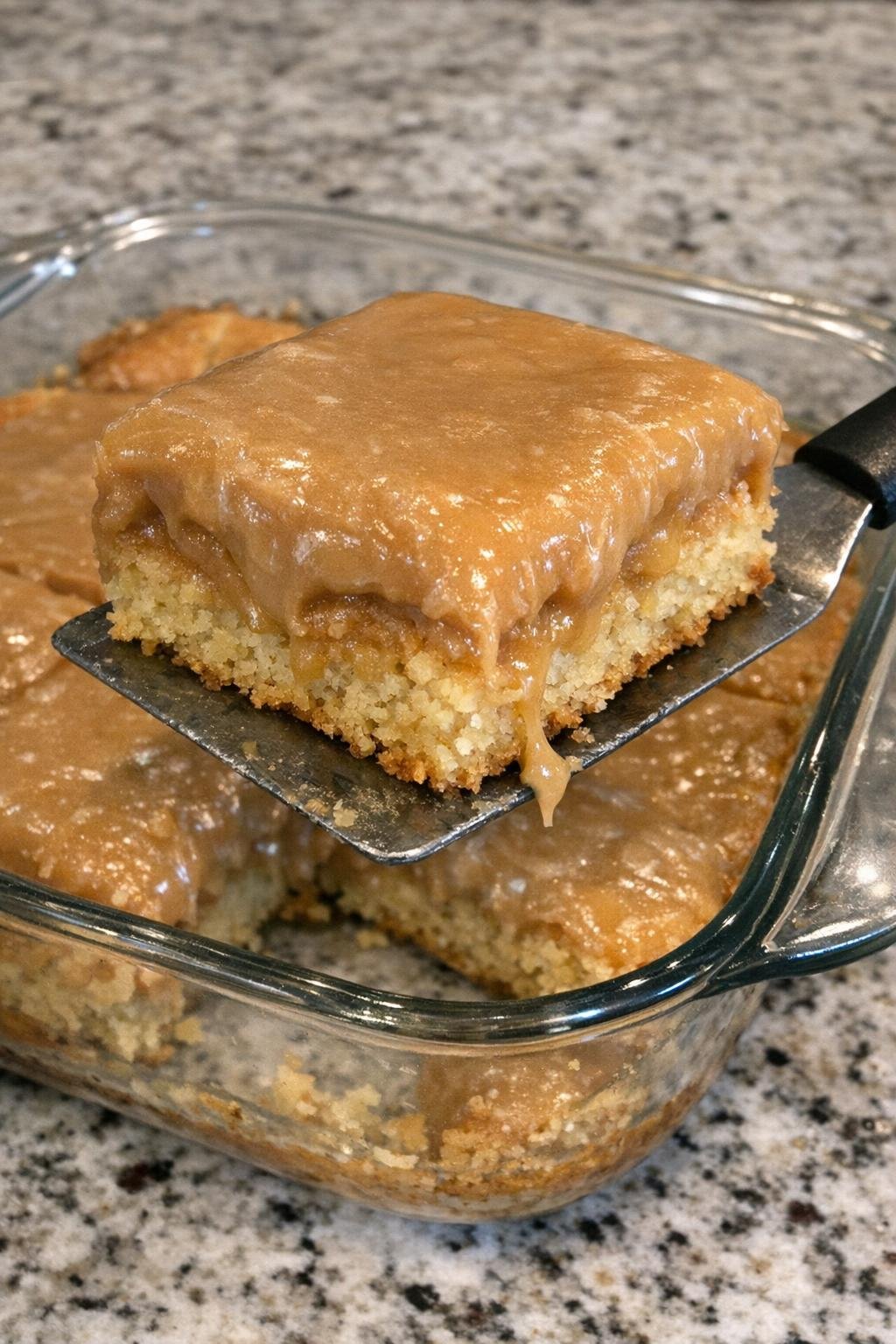 Gooey peanut butter dessert bars in a glass baking dish