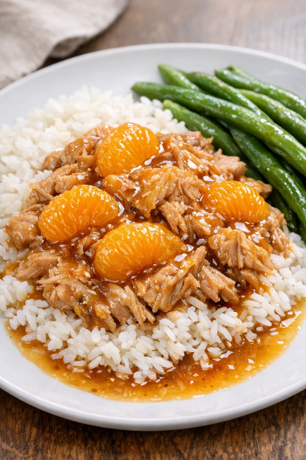 Final plated mandarin pork with sides